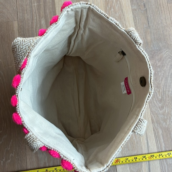 NWT. Pom Pom boho style tote. Lined w/ zip pocket & snap closure. Bright colors. - Picture 3 of 7